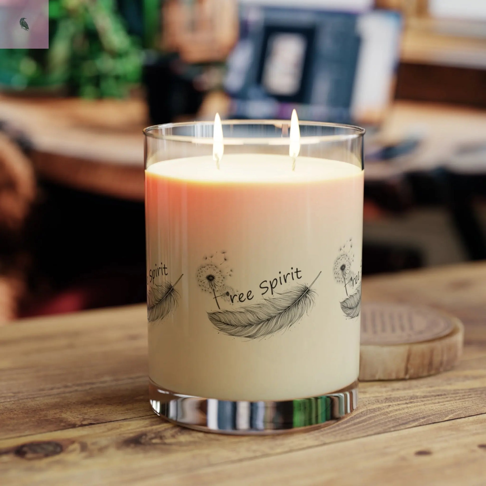 free spirit. Glass 11 oz soy wax feather   candle the flirty crow